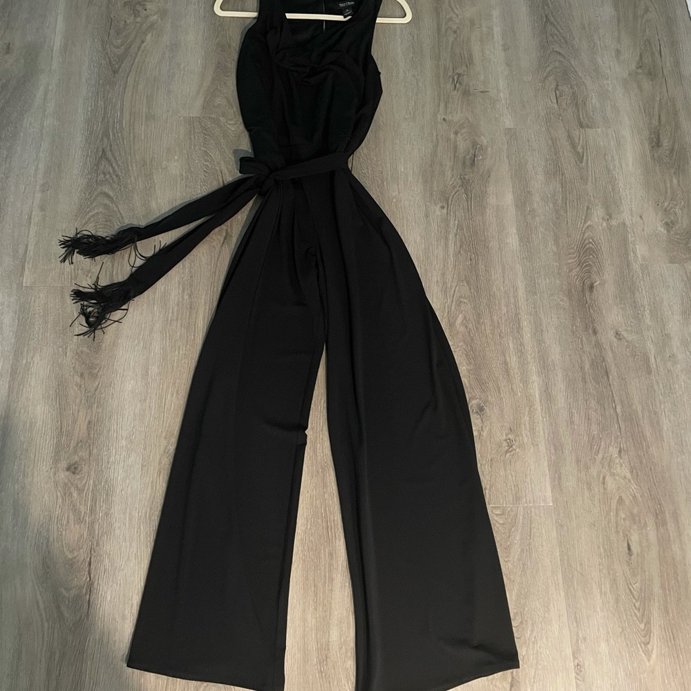 Black sleeveless one piece pant jumpsuit